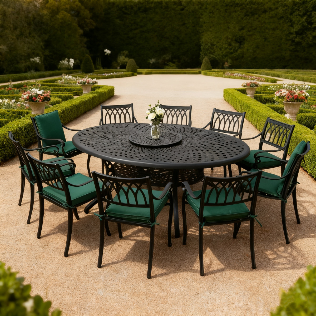 Round dining table surrounded by chairs, shaded by a large beige umbrella, set in a lush garden near a brick wall.